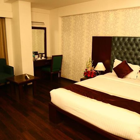 Comfy Business Hotel Bangalore Bagian luar foto