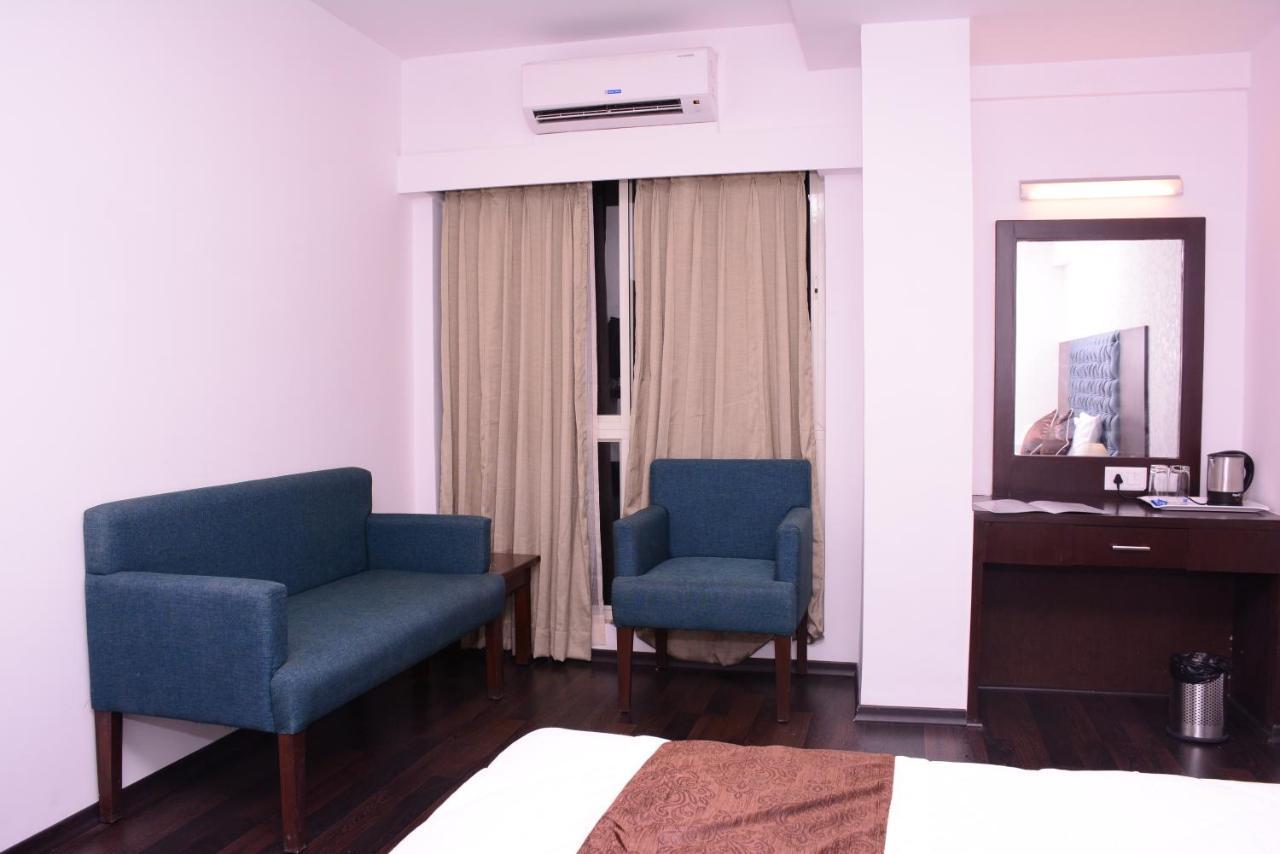 Comfy Business Hotel Bangalore Bagian luar foto